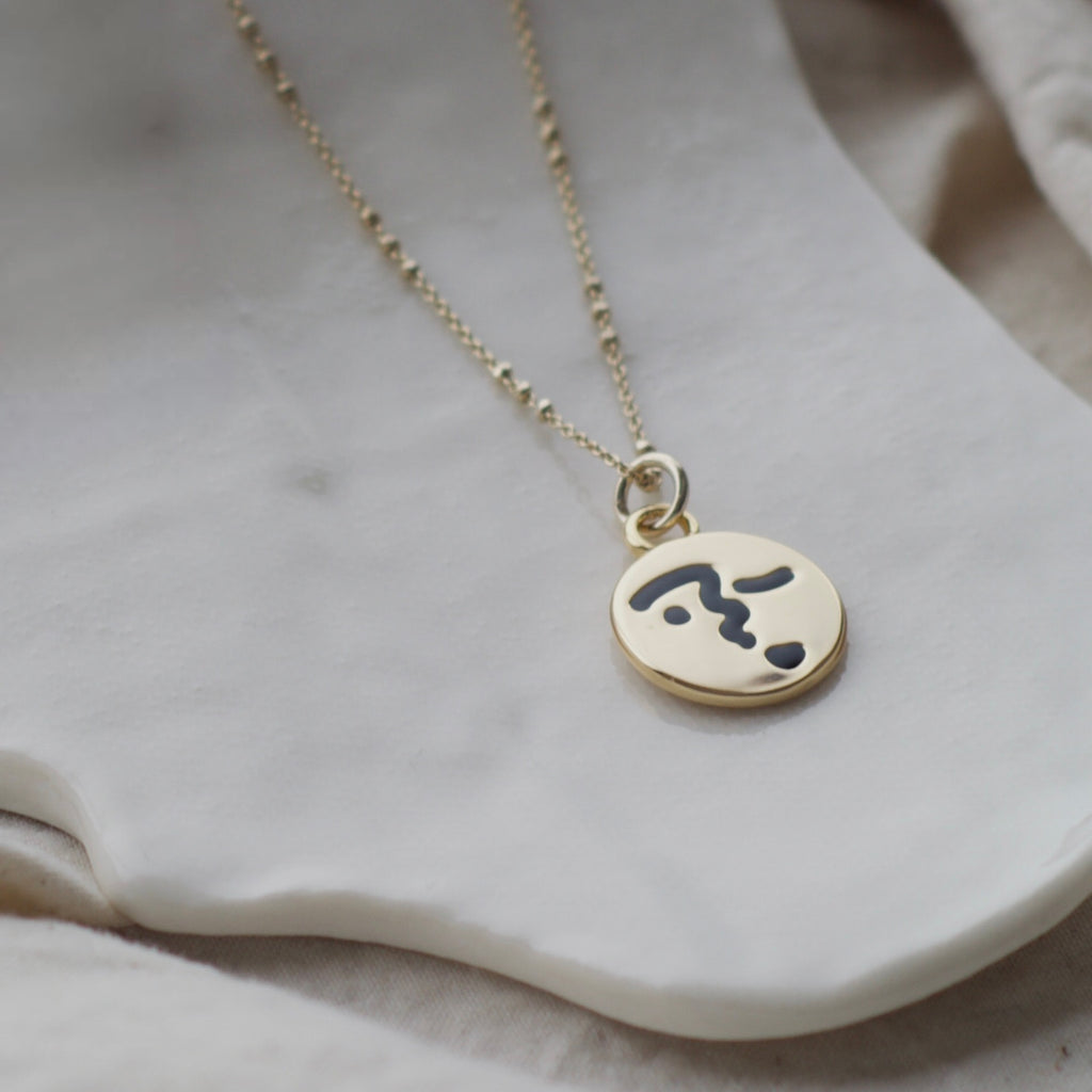 Heart lip face necklace
