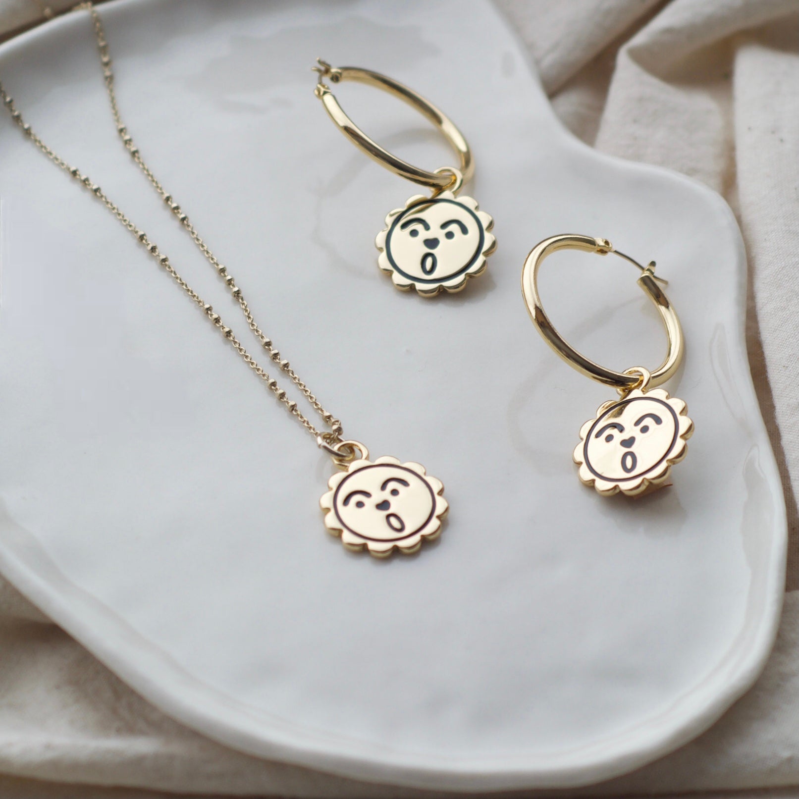 Oh sunny face hoop earrings