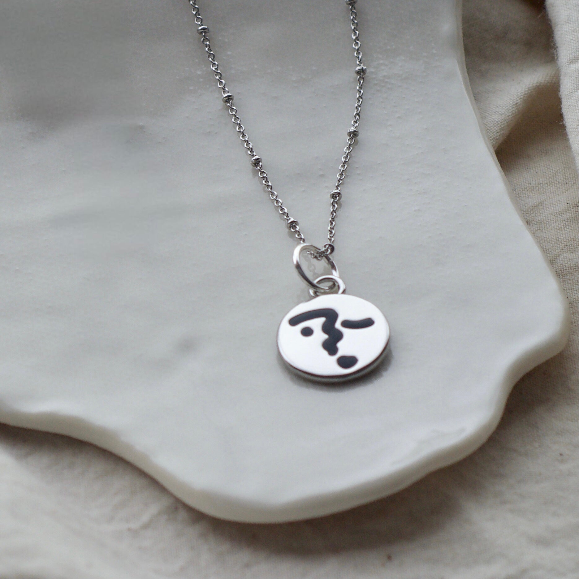 Heart lip face necklace