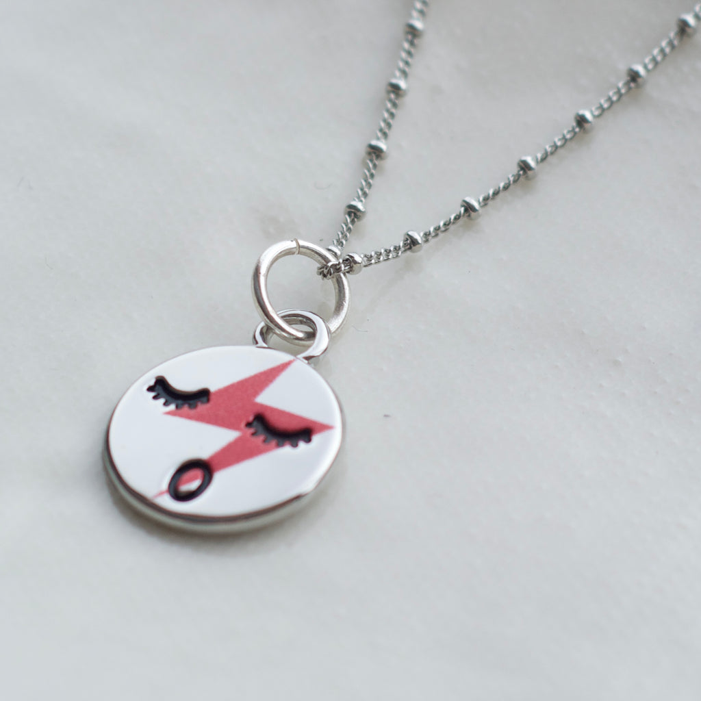 Red lightening face necklace