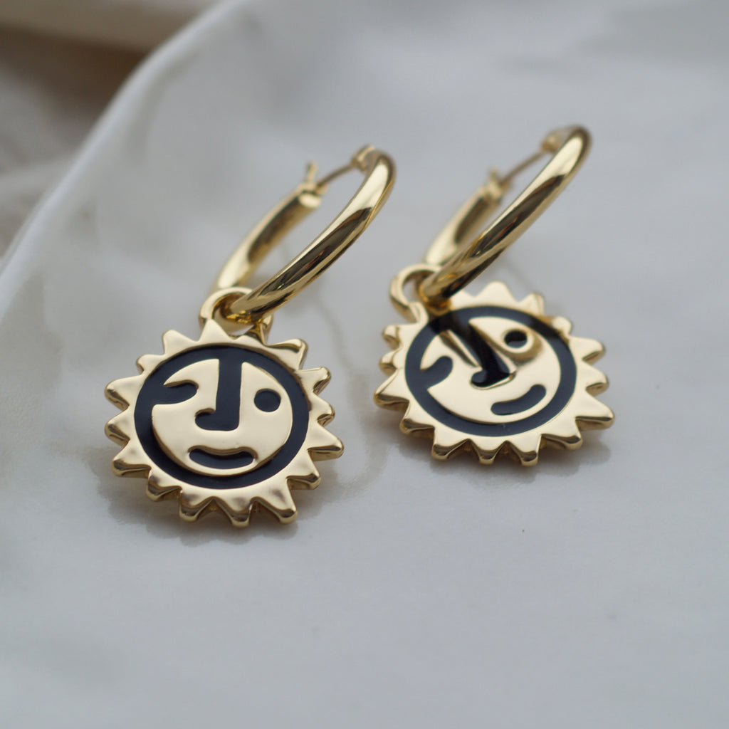 Sunny lion face hoop earrings