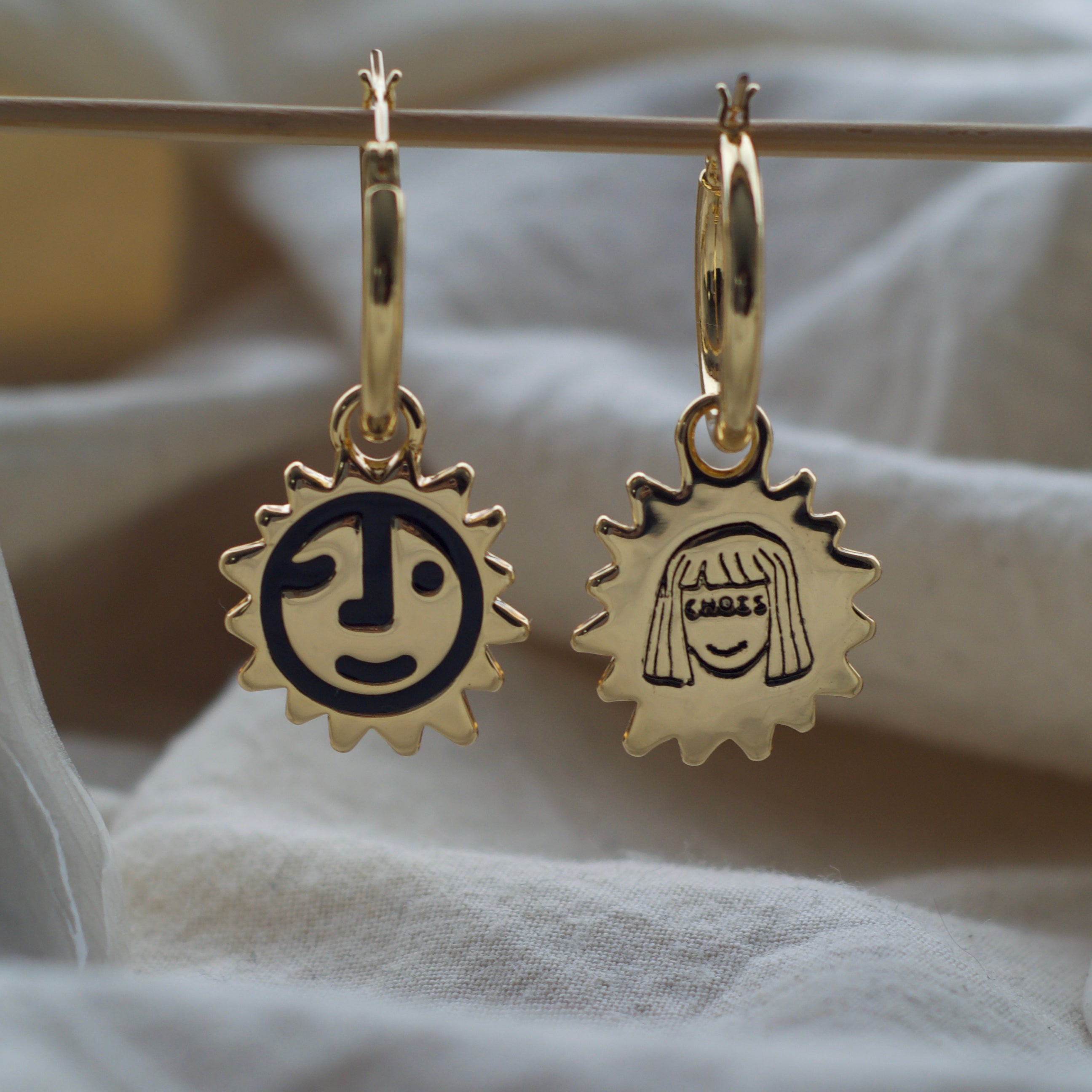 Sunny lion face hoop earrings