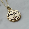 Winking sun face necklace