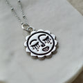 Sun's crystal dreaming face necklace