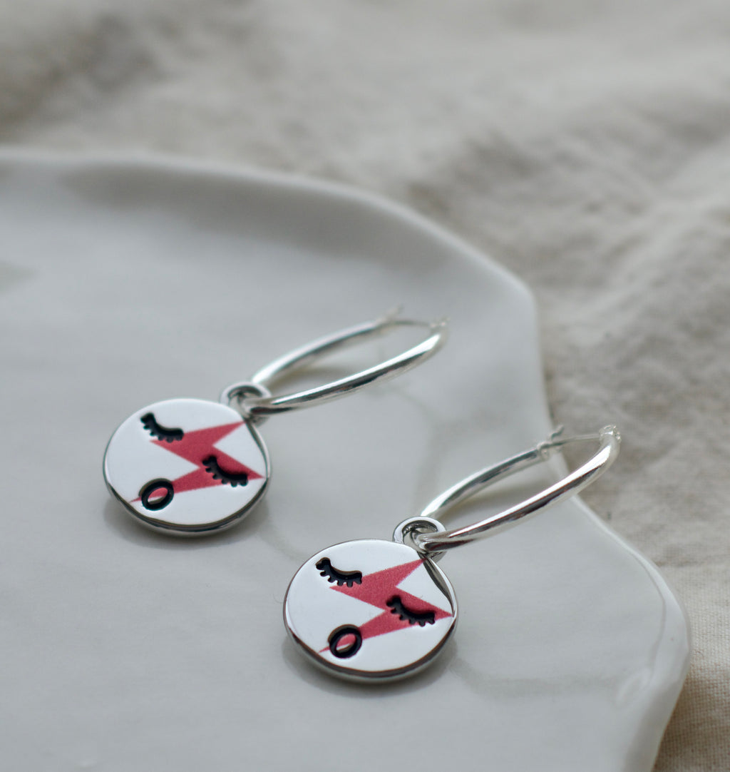Red lightening face hoop earrings