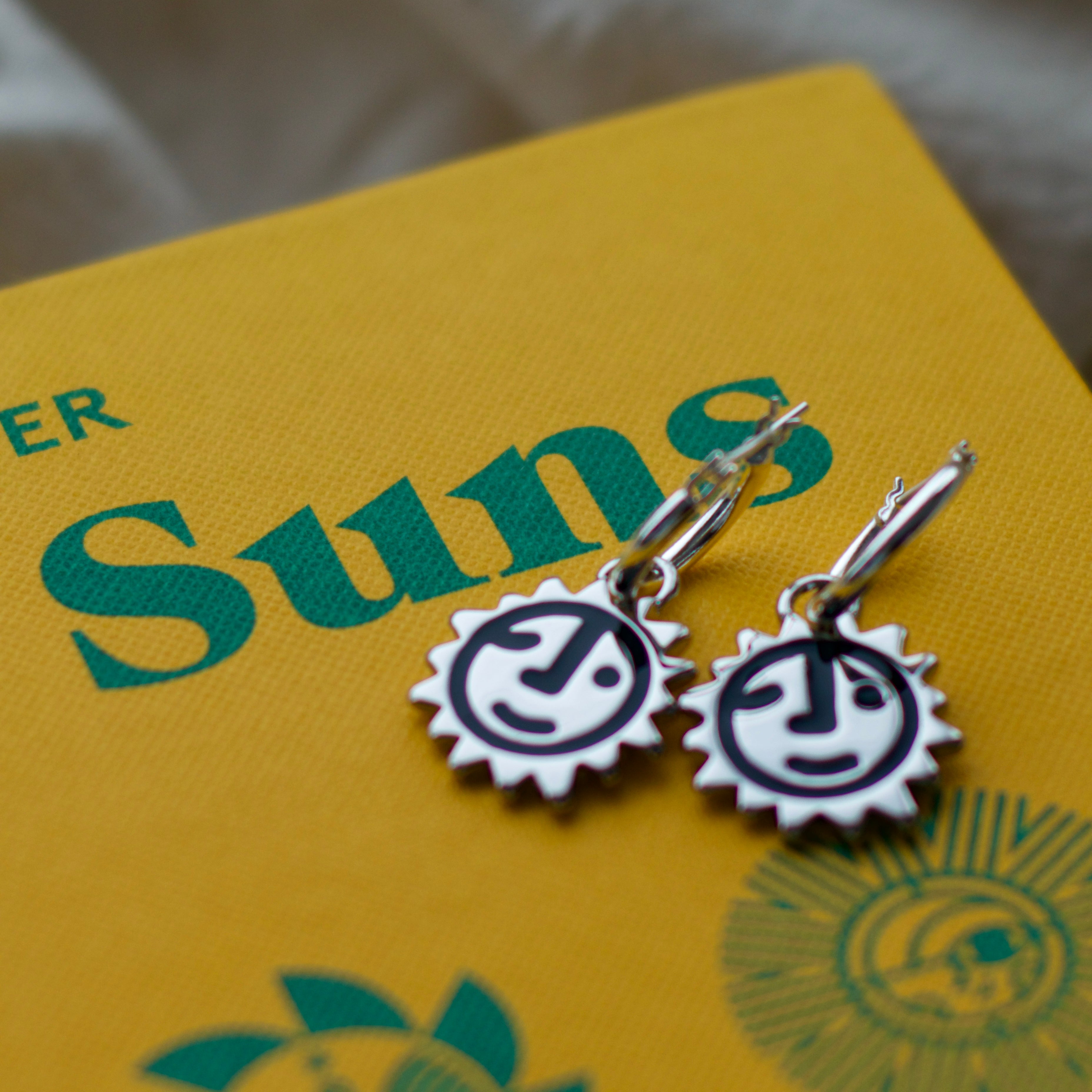 Sunny lion face hoop earrings