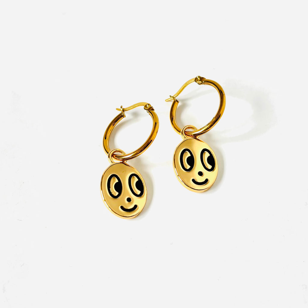 Big eyed smiley face hoop earrings