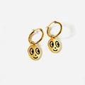Big eyed smiley face hoop earrings
