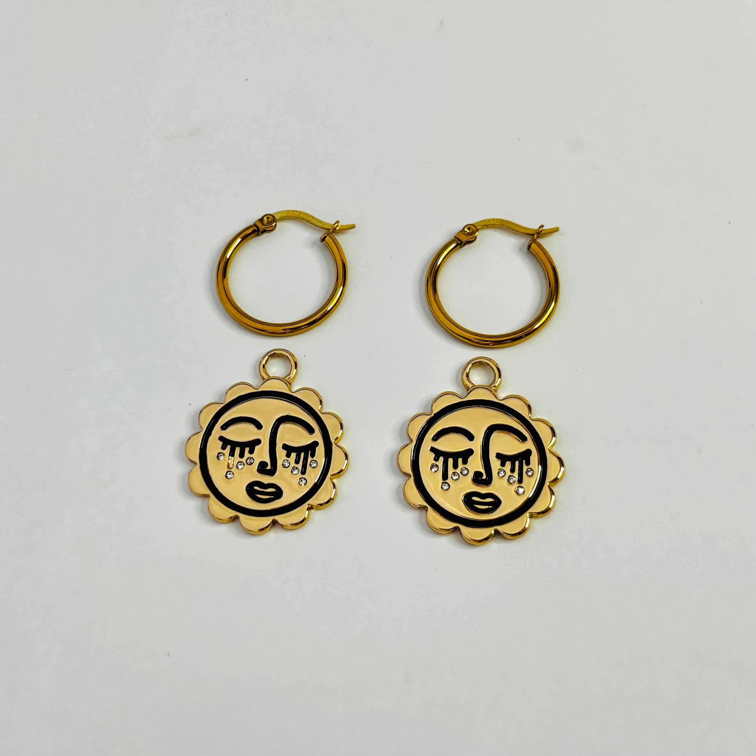 Sun's crystal dreaming face hoop earrings