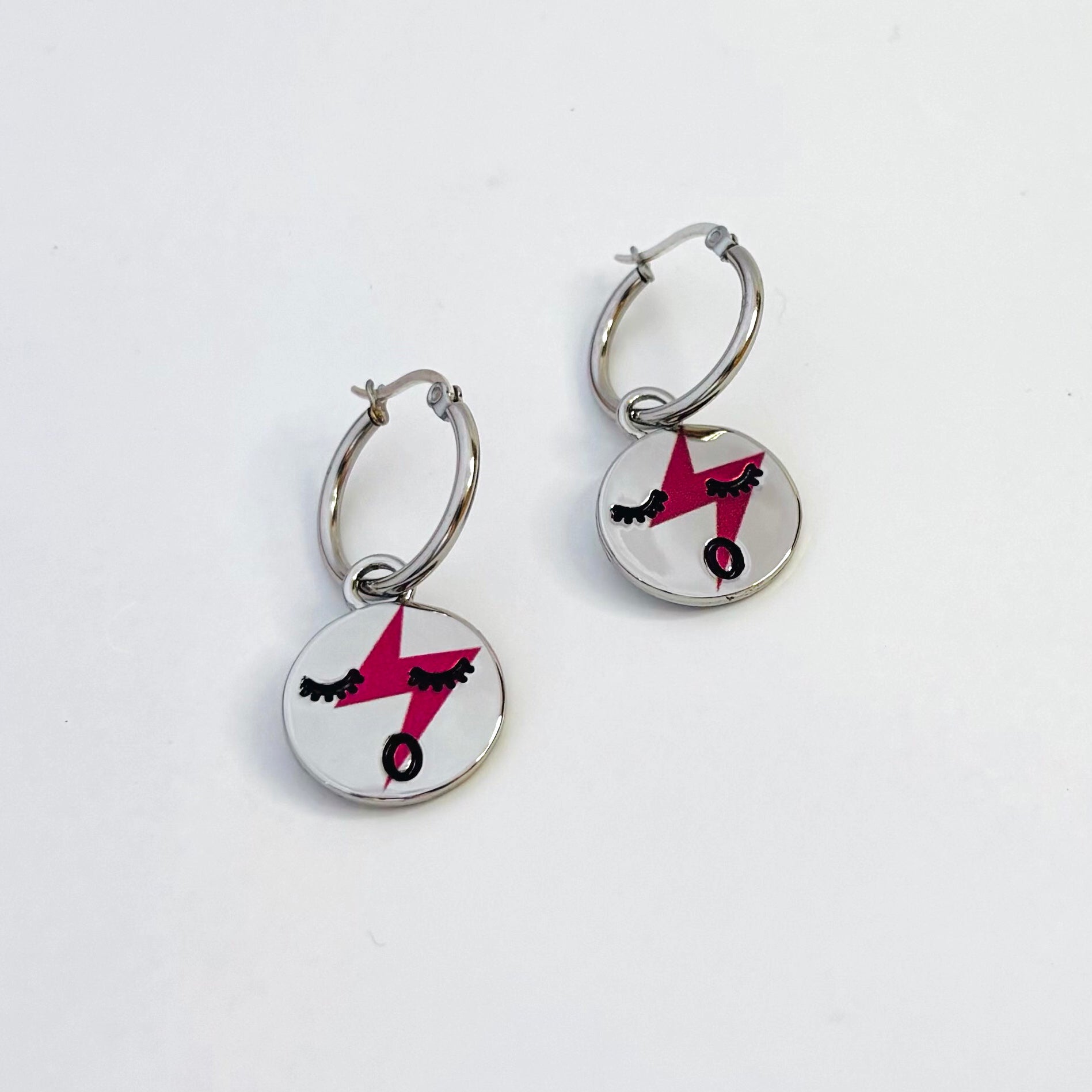 Red lightening face hoop earrings