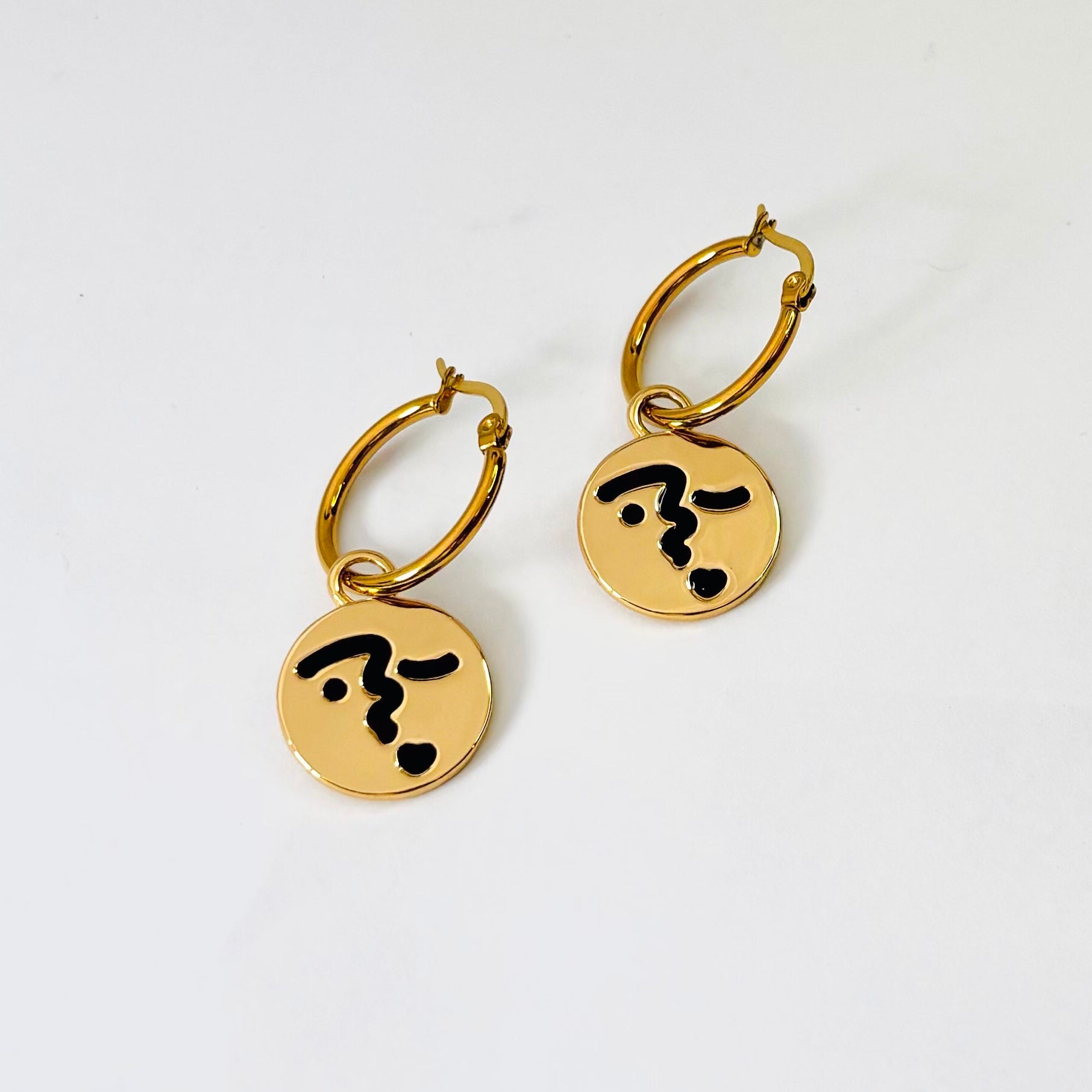 Heart lip face hoop earrings