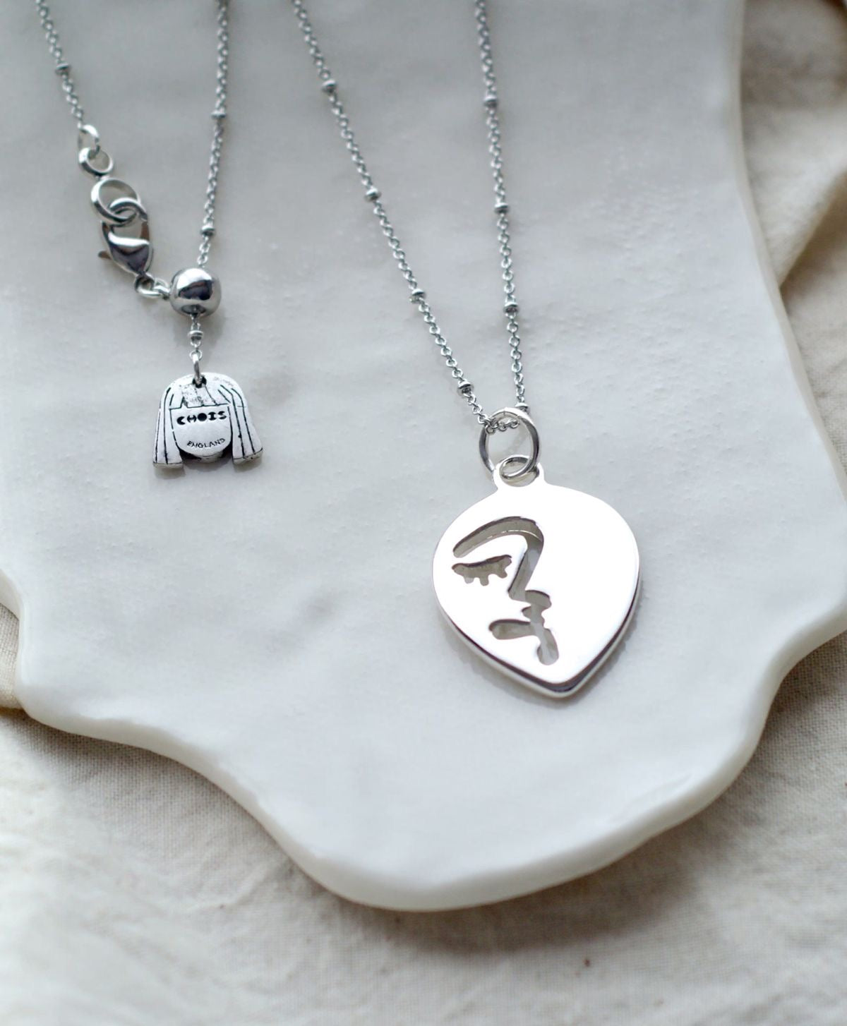 Half abstract face necklace