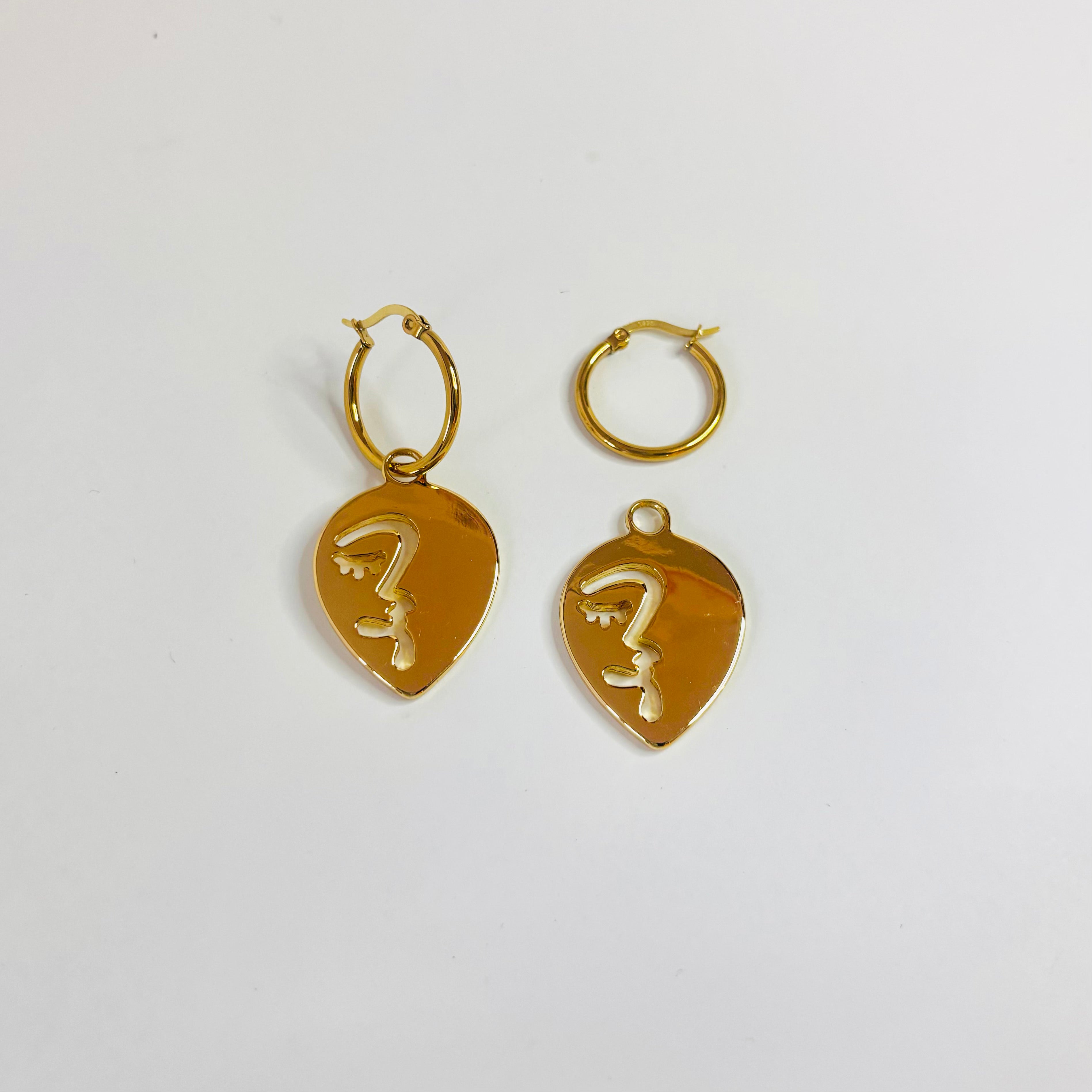 Half abstract face hoop earrings