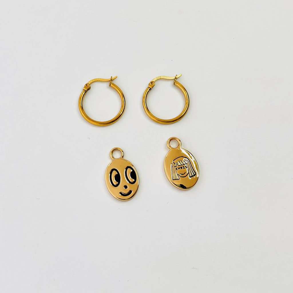 Big eyed smiley face hoop earrings