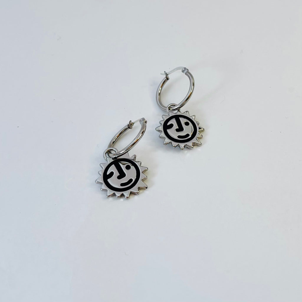 Sunny lion face hoop earrings