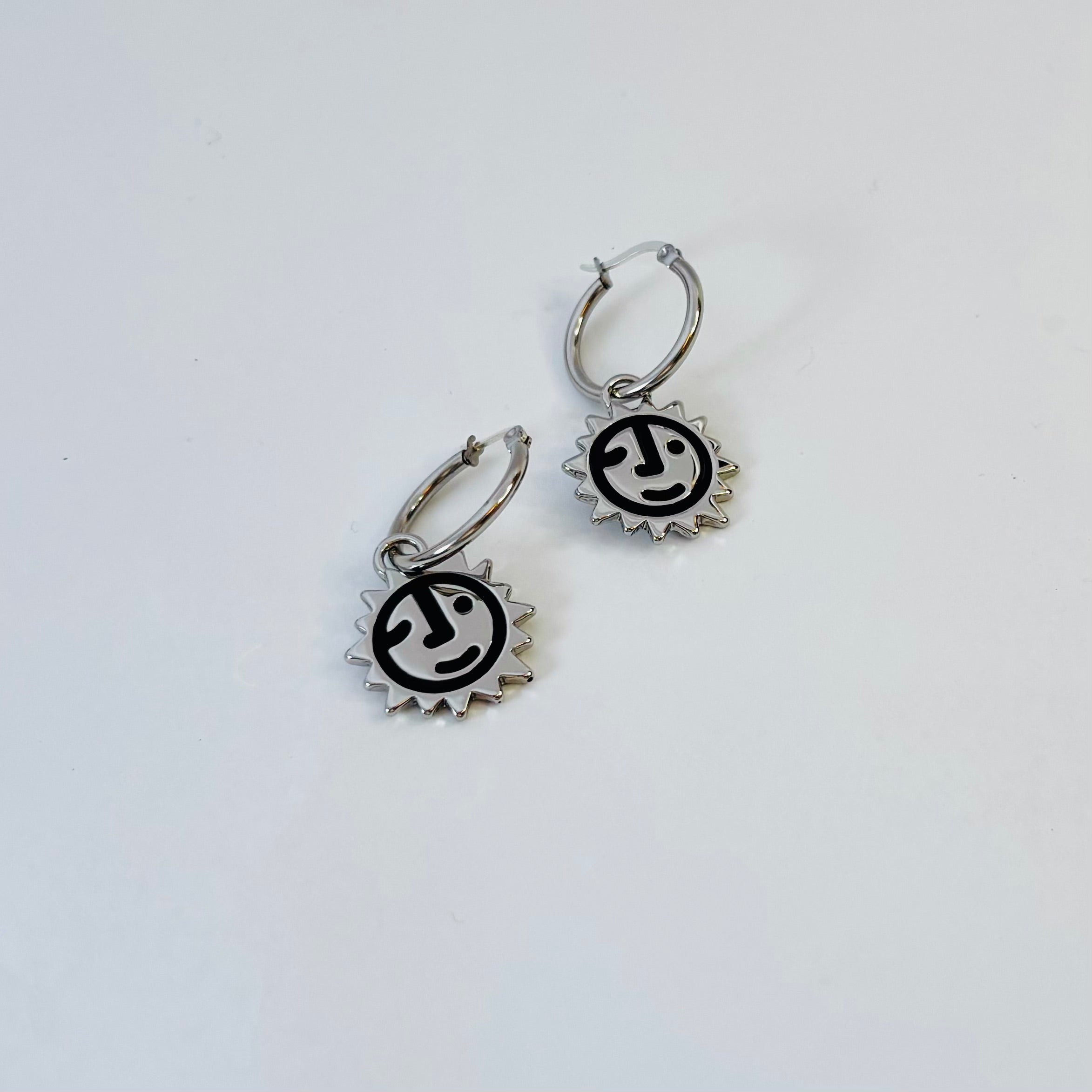 Sunny lion face hoop earrings
