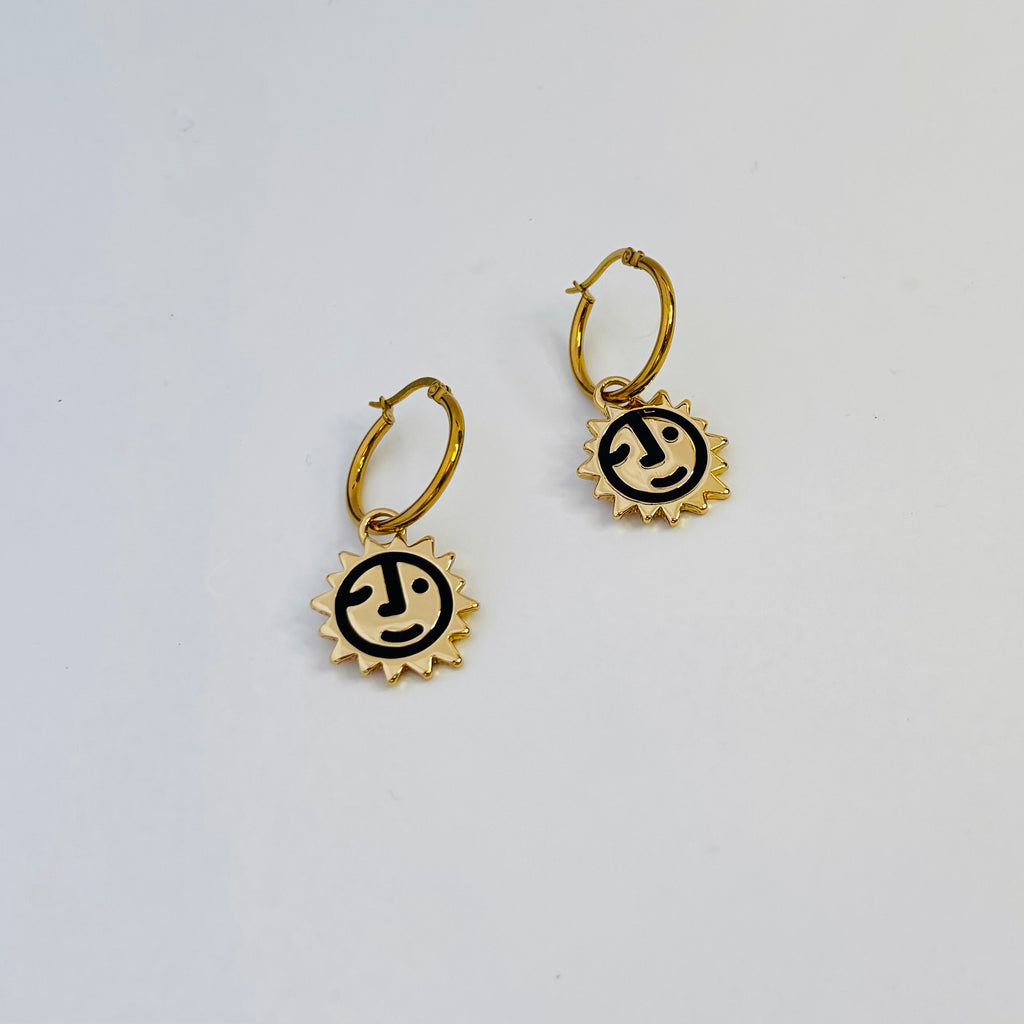 Sunny lion face hoop earrings