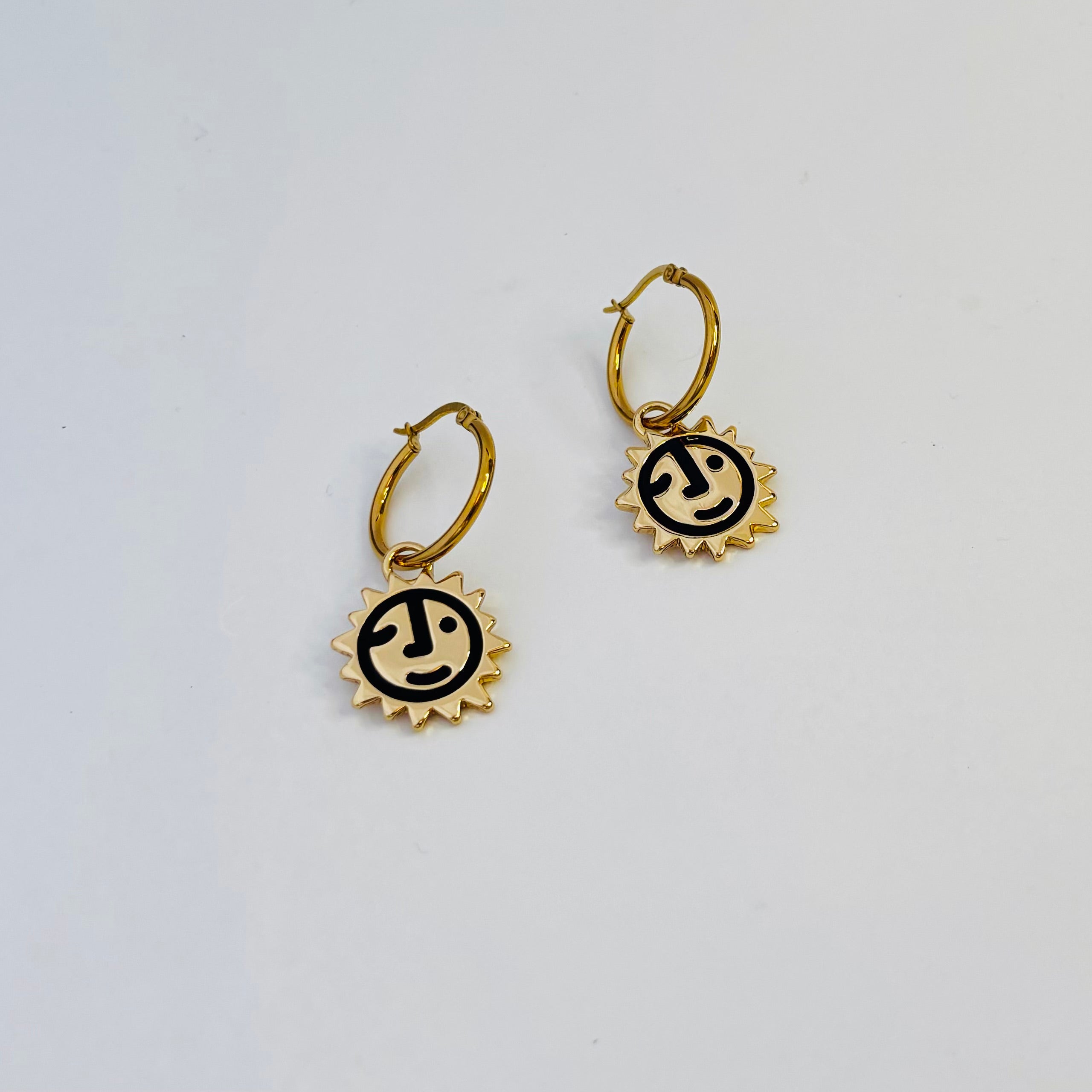 Sunny lion face hoop earrings