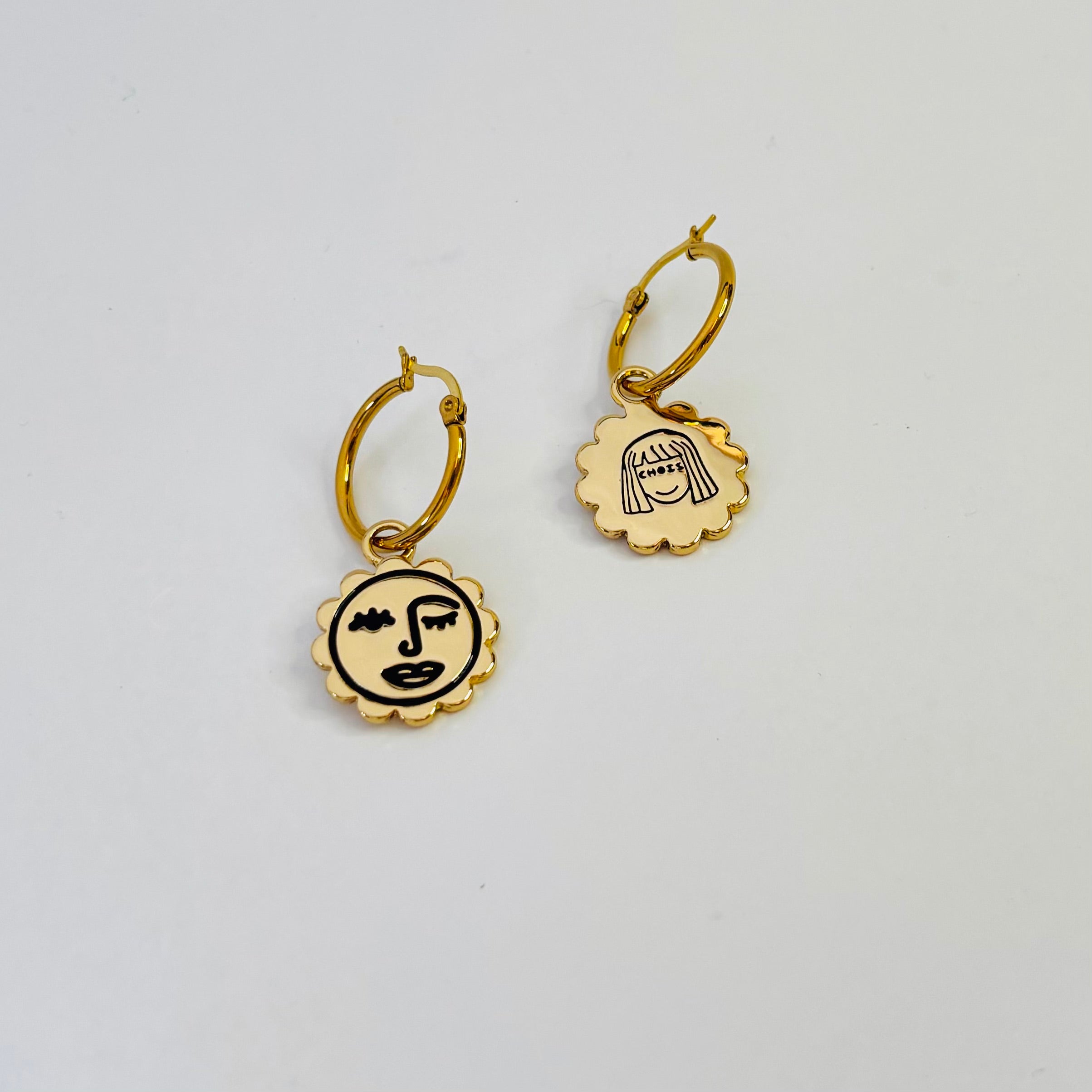Winking sun face hoop earrings