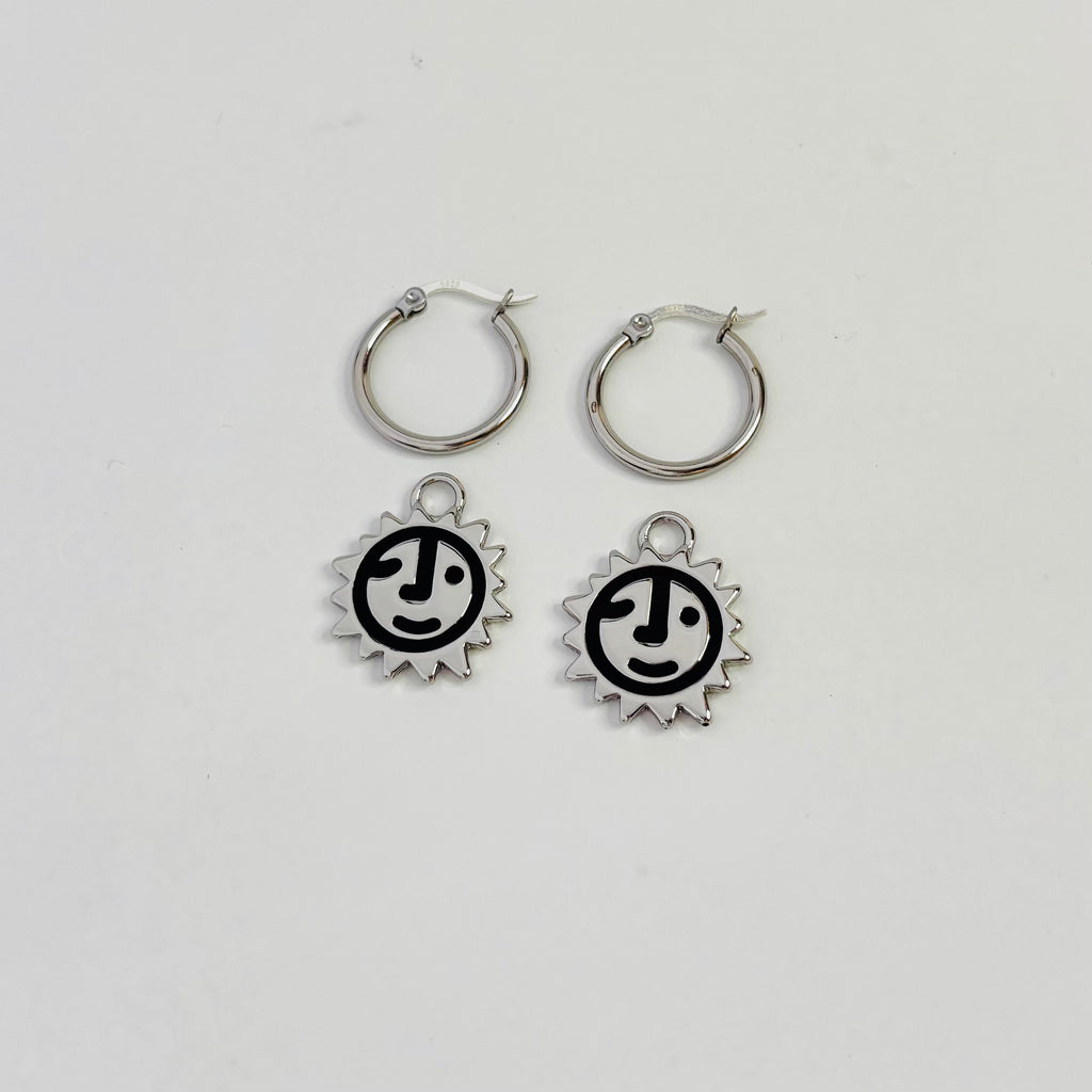 Sunny lion face hoop earrings