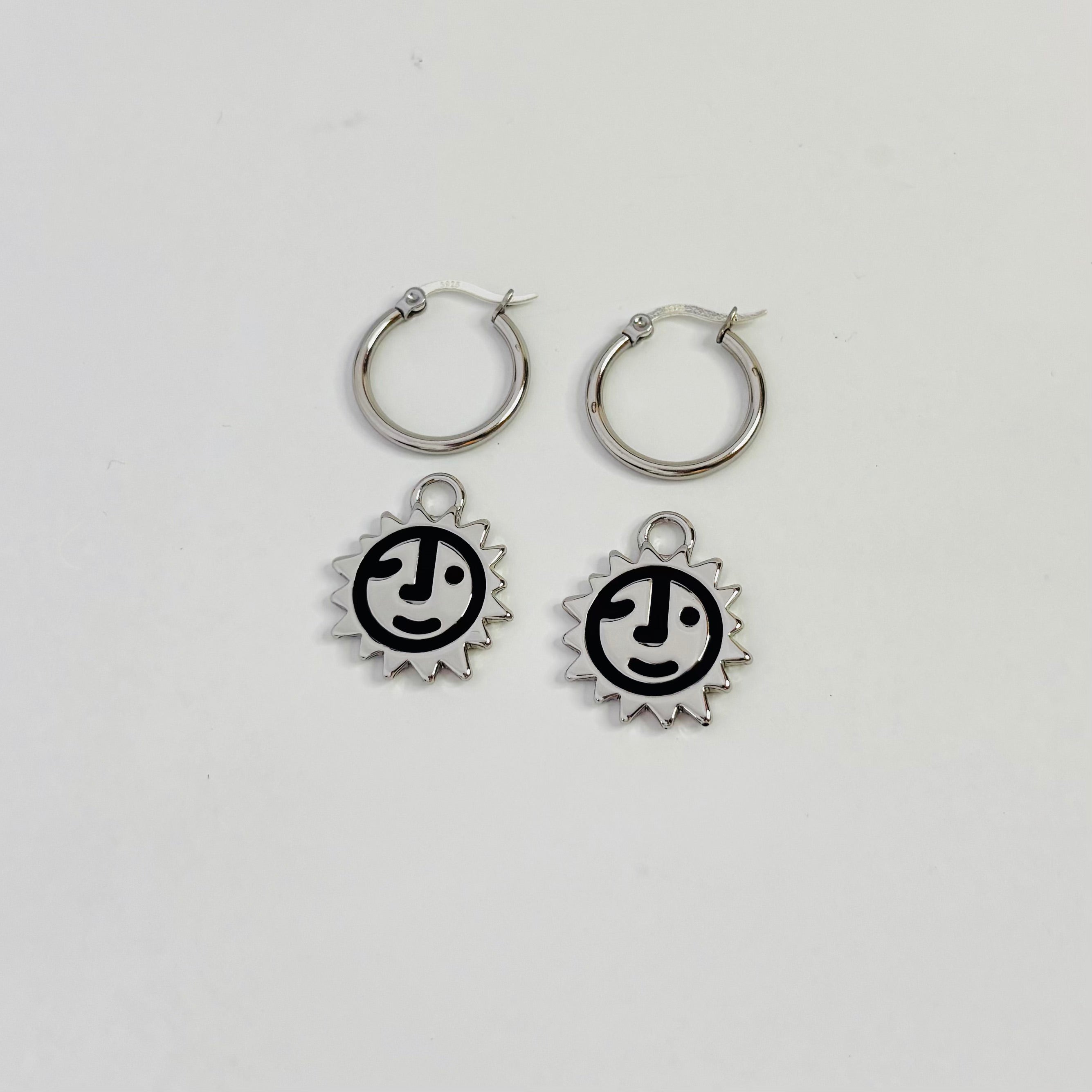 Sunny lion face hoop earrings