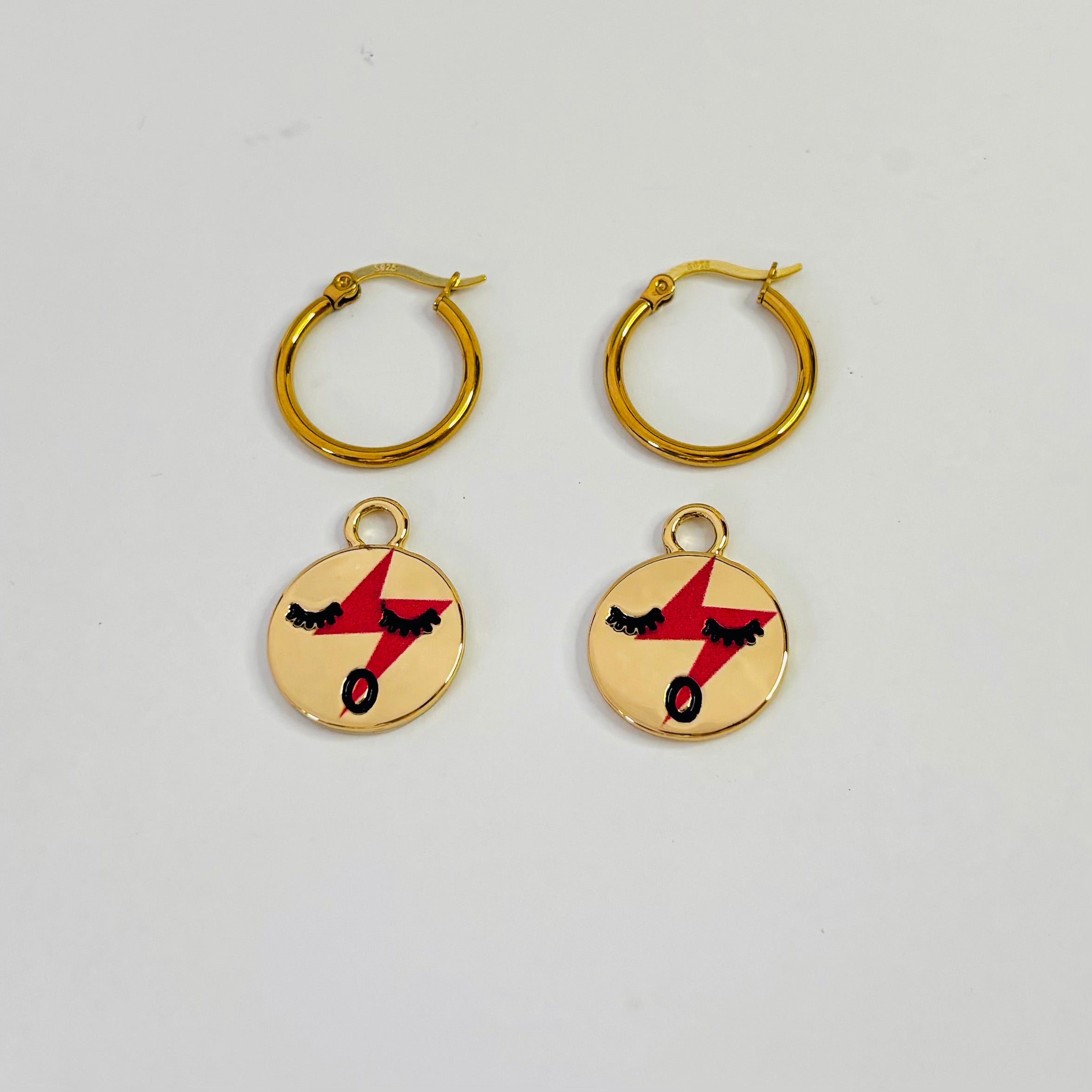 Red lightening face hoop earrings