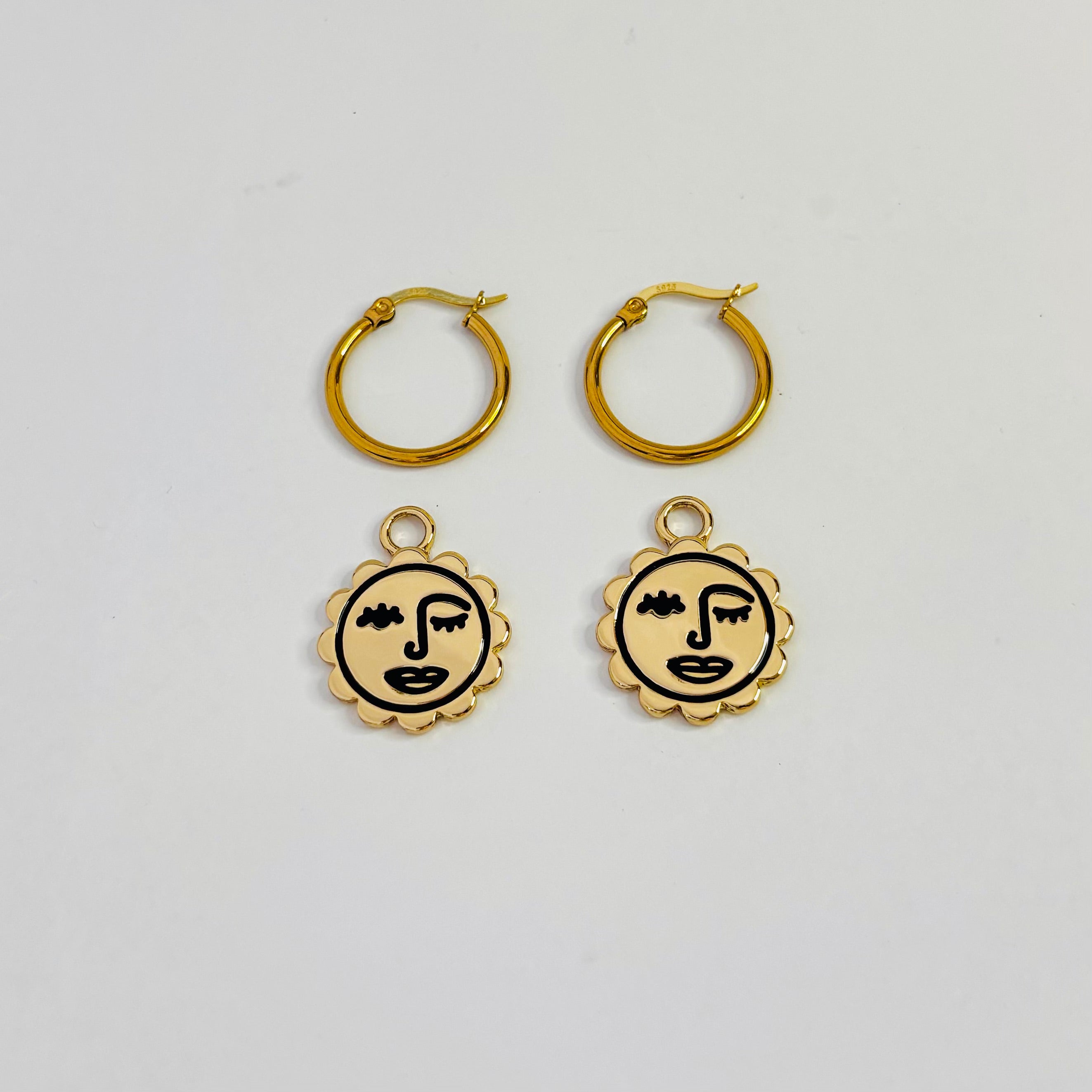 Winking sun face hoop earrings