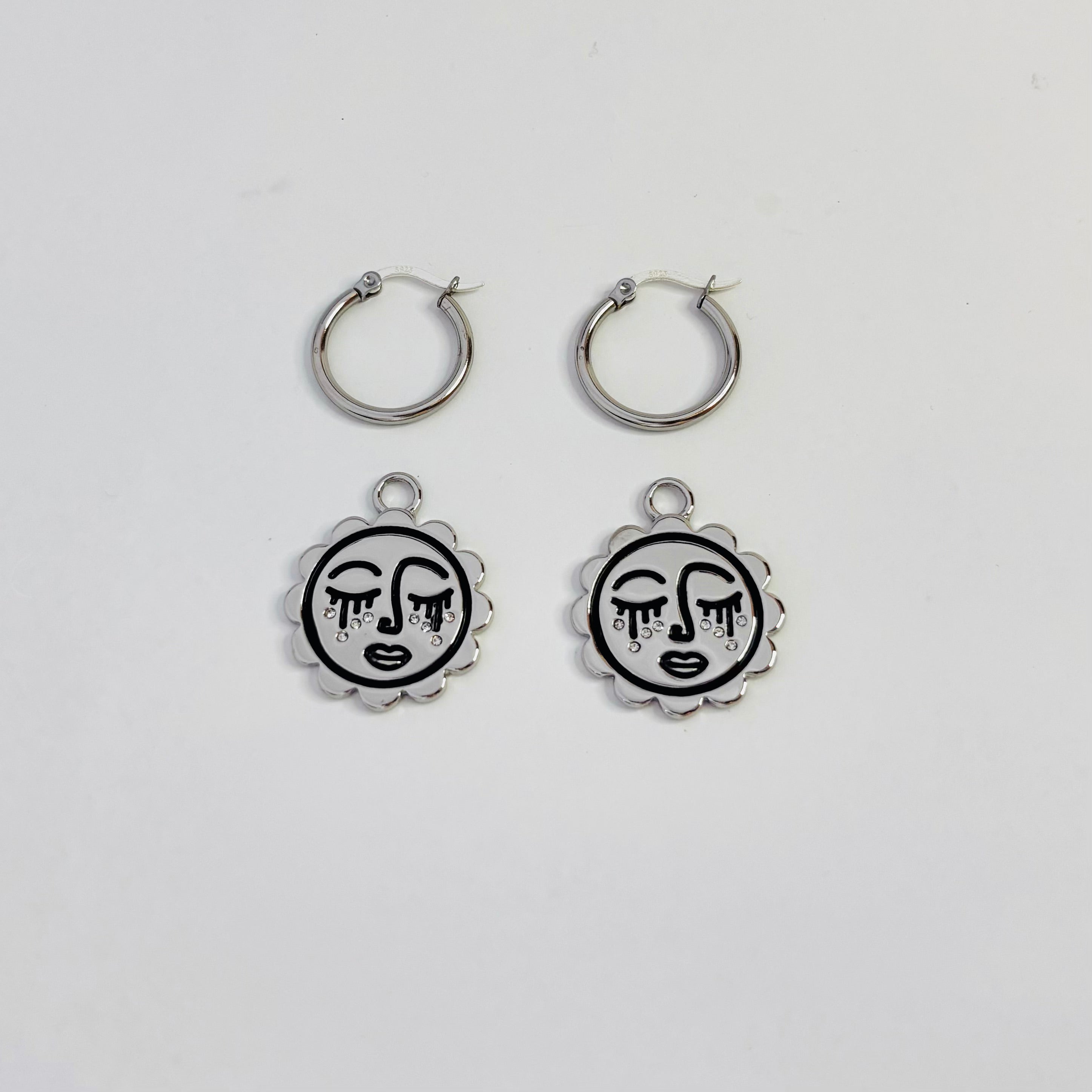 Sun's crystal dreaming face hoop earrings