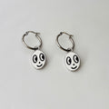 Big eyed smiley face hoop earrings