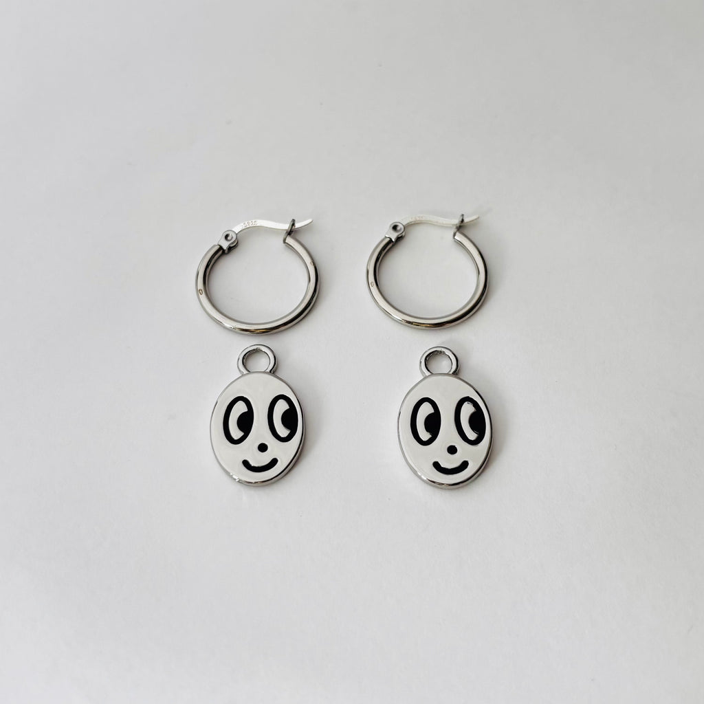 Big eyed smiley face hoop earrings