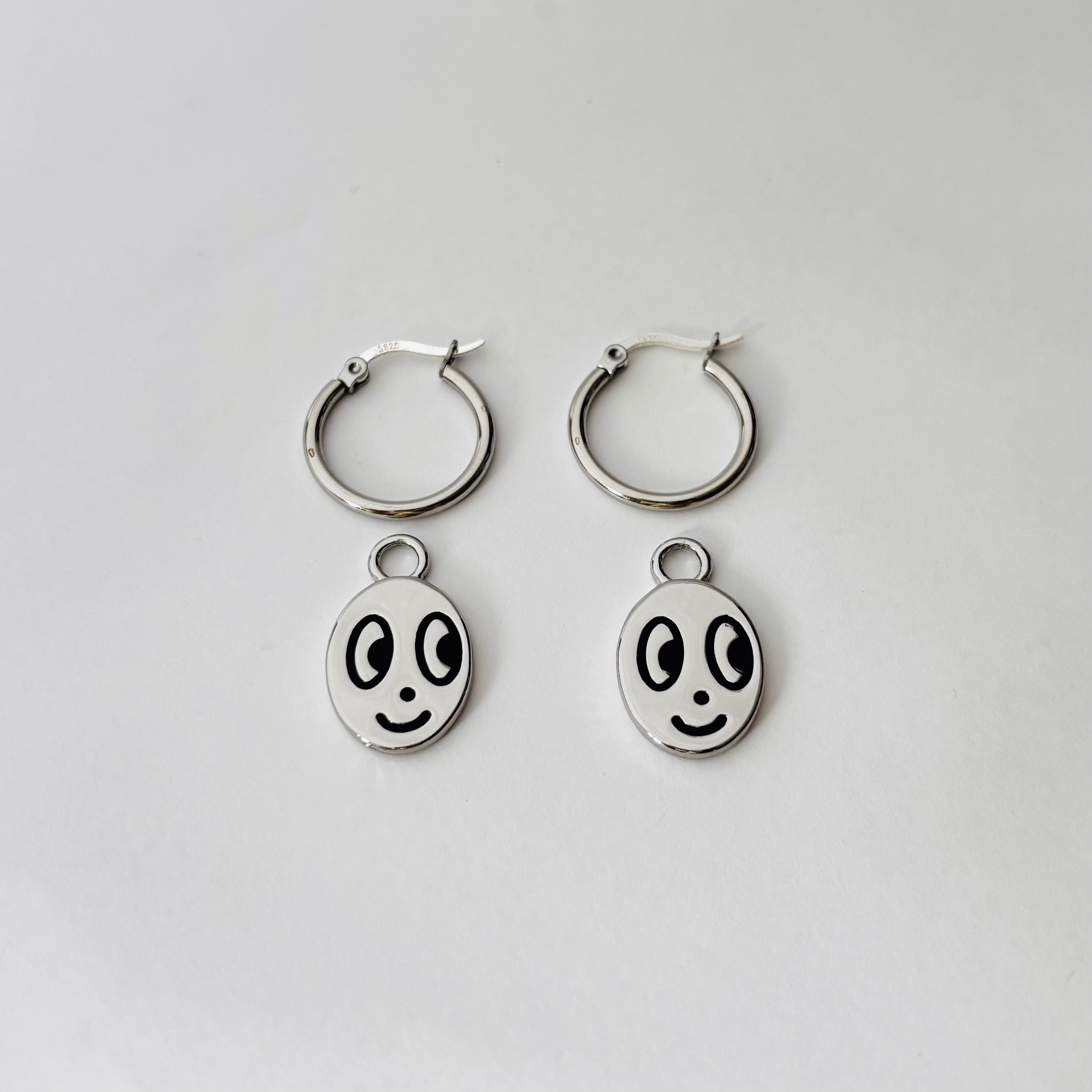 Big eyed smiley face hoop earrings